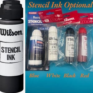 May include: A collection of Wilson stencil ink bottles in black, blue, white, and red. The black bottle is shown in the foreground, while the others are in their original plastic packaging. The text on the bottles reads Wilson Stencil Ink.