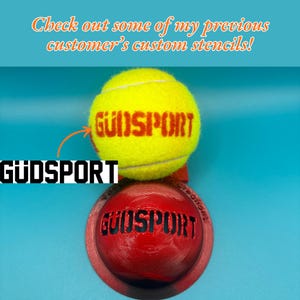 May include: A bright yellow tennis ball featuring the red text GUDSPORT, positioned above a red circular stencil tool that also displays the black text GUDSPORT. The image includes the text Check out some of my previous customer's custom stencils!