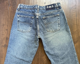 Jeansy damskie Vintage Y2K z lat 90. LEI, 30x33, z niskim stanem i rozszerzanymi nogawkami, z bawełny, w stylu western