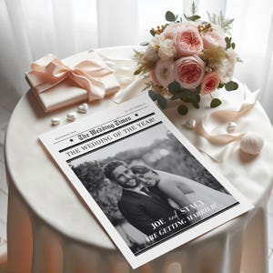 May include: A black and white wedding announcement with a photo of a couple. The headline reads "The Wedding Times" and "The Wedding of the Year!" The text below the photo reads "Joe and Stacy are getting married!"