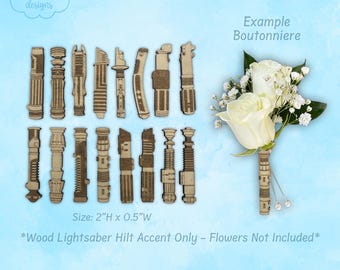 May include: A collection of fifteen laser-cut wooden lightsaber hilt accents, each measuring 2 inches high by 0.5 inches wide. One hilt is shown attached to a white rose boutonniere. Text reads: Raindrop Designs, Example Boutonniere, Size: 2"H x 0.5"W, *Wood Lightsaber Hilt Accent Only - Flowers Not Included*, lightsaber hilt boutonniere accent.