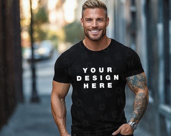 May include: Black crew neck t-shirt with the text "YOUR DESIGN HERE" in white block letters. The shirt is short-sleeved and appears to be made of a soft material. The image is a product mockup.