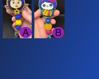 Coraline inspired badge reel. This listing is for ONE badge reel of your choice.