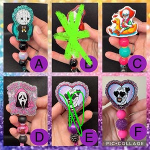 May include: A collection of six retractable badge holders with various horror-themed designs. The designs include characters like Pinhead, Pennywise, and the Ghostface mask. Each badge holder has a unique bead and charm design.