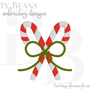 May include: Two embroidered candy canes with red and white stripes, tied together with a green bow. The image has the text "Bitty Beans embroidery designs" at the top and "See listing information for sizes available" at the bottom.
