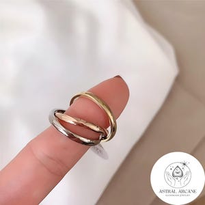 Bague tournante Fidget en métaux mélangés • Bague anti-anxiété tricolore entrelacée • Bijoux plaqués or • Cadeau tendance pour elle • Anneau à roulettes
