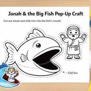 May include: A black and white pop-up craft sheet featuring a large fish with an open mouth and a cartoon figure of Jonah. The text "Jonah & the Big Fish Pop-Up Craft" is at the top, with instructions below. Includes a fold line.