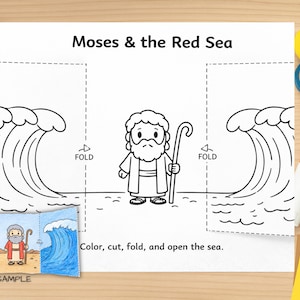May include: A black and white line drawing of Moses and the Red Sea. The image includes the text "Moses & the Red Sea" and instructions to color, cut, fold, and open the sea. Craft supplies like glue, colored pencils, and tape are visible.