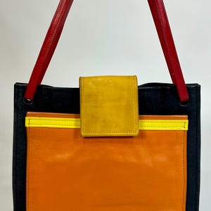 1980’s vintage unique color-block ostrich & leather shoulder/handbag purse by designer Hans Koch