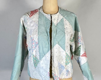 1930’s cotton quilt fabric-turned-reversible jacket with sashiko stitching repair