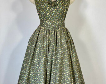 Vintage 1950’s ditsy floral print cotton 2-pc. Halter top and skirt set