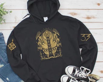 Sudadera con capucha bordada de Esquie Clair Obscur Expedition 33, elegante merchandising del juego
