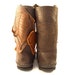 see more listings in the Shin High Moccasins section