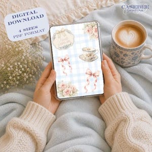 May include: A digital tablet screen displaying a light blue and white checkered background with illustrations of pink roses, two pink ribbons, a teacup on a saucer, and a decorative label with the text Kindle GIRLIE in a script font.