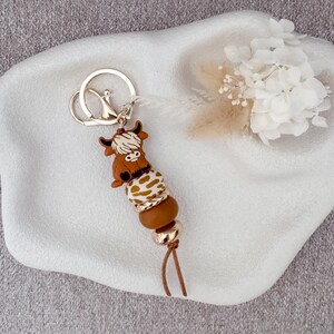 Highland Cow Keychain | Western Aesthetic Gold Acrylic | Silicone Bead Bag Tag Brown Cow/Cow Print