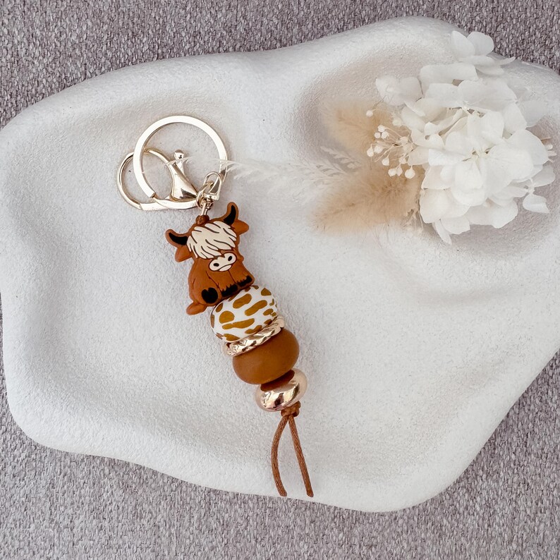Highland Cow Keychain | Western Aesthetic Gold Acrylic | Silicone Bead Bag Tag Brown Cow/Cow Print