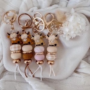 Highland Cow Keychain: Gold Acrylic, Silicone Bead Bag Tag