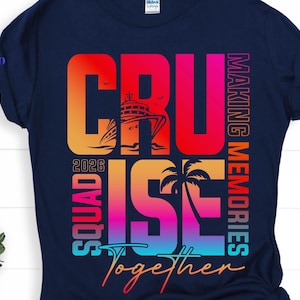 May include: Navy blue t-shirt with a colorful graphic design. The design features the words "CRUISE SQUAD 2026" and "MAKING MEMORIES TOGETHER" with a cruise ship, palm tree, and sunset illustration.