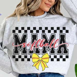 May include: Gray sweatshirt with a black and white checkered pattern and the text "Mama Softball" in black with a yellow and red bow.