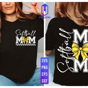 May include: Black t-shirt with "Softball Mom" in white script and block letters, featuring a yellow bow and a checkered pattern. The back of the shirt repeats the design with "Softball" in script and the "MOM" design.