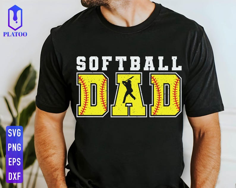May include: Black t-shirt with the text "Softball Dad" in white letters. The text is surrounded by two yellow softball graphics with red stitching.
