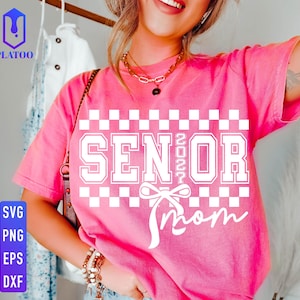 May include: A pink t-shirt with the words "SENIOR 2024 Mom" in white block letters and a bow graphic. The shirt has a checkered pattern above the text. The image also includes a logo with the words "SVG PNG EPS DXF".