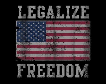 May include: A distressed design featuring the American flag with the words "LEGALIZE" above and "FREEDOM" below in a bold, textured font. The flag's stars and stripes have a worn, vintage appearance, set against a black background.