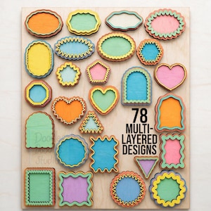 May include: A collection of 78 multi-layered wooden shapes in various colors including orange, green, blue, yellow, and pink. The shapes feature scalloped, wavy, and straight edges in geometric forms like hearts, rectangles, and circles.