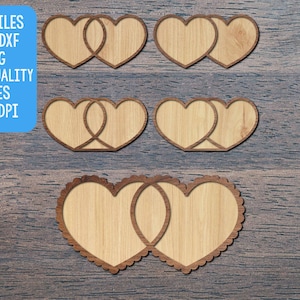 Könnte beinhalten: Holzherzförmige Schnittdateien in verschiedenen Designs. Das Bild zeigt mehrere Paare ineinandergreifender Herzen mit hellem Holzmaserungsfinish und dunkelbraunen Rändern. Der Text im Bild lautet "CUT FILES SVG, DXF, PNG HIGH QUALITY FILES 300 DPI".