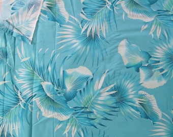 Marianne of Maui Hawaiian Quilting Fabric Turquoise Large Leaves in Batik style print