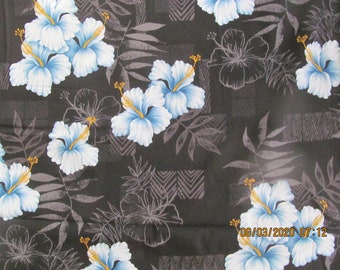 Marianne of Maui Hawaiian Quilting Fabric Charcoal  with Bluish  Hibiscus and Island Echoes in Background