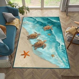 May include: A rectangular area rug featuring a printed design of a sandy beach meeting turquoise ocean waves. The rug displays three brown sea turtles swimming in the water and two orange starfish, one on the sand and one in the shallow water.