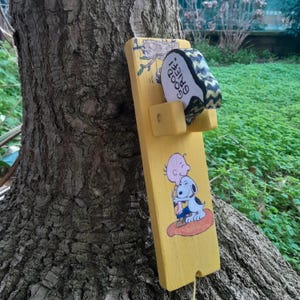 Snoopy battiporta in legno