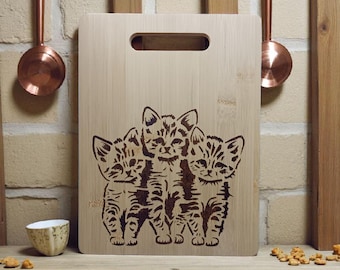 Bamboo chopping board with cute trio of cats burned by hand using pyrography