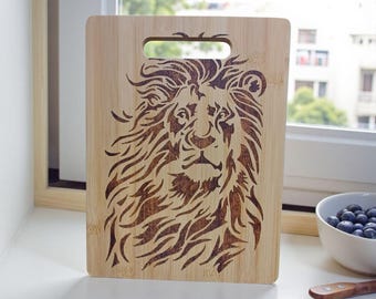 Bamboo cutting board featuring a Majestic lion with Pyrography done by hand