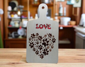 We love our furbabies on a wooden paddle. Done with pyrography and acrylic pens.