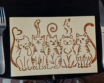 Wooden placemats with pyrography done by hand