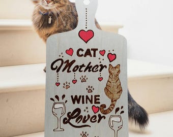 A fun quote for cat mums on a wooden paddle. Done with pyrography and acrylic pens.