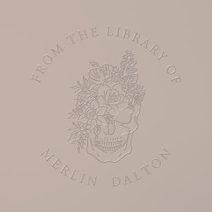 May include: A beige design featuring a skull adorned with floral elements. The text "FROM THE LIBRARY OF MERLIN DALTON" is embossed around the skull. The design is centered on a beige background.