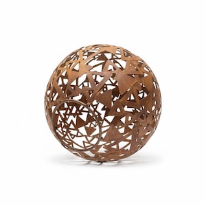 May include: A spherical, openwork metal sculpture with a rusted brown finish. The sphere is constructed from interconnected triangles, creating a geometric pattern. The design allows light to pass through, creating interesting shadows.