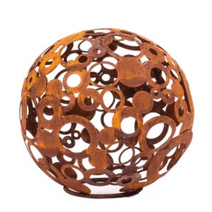 May include: A spherical, decorative metal sculpture with a rusted finish. The sphere is composed of overlapping circles of varying sizes, creating an open design. Suitable for outdoor use, it adds a unique touch to any garden or patio. The sculpture is made of metal.