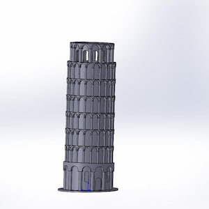 May include: A 3D printed model of the Leaning Tower of Pisa, a famous landmark in Italy. The model is made of gray plastic and features intricate details, including the tower's arches and windows.