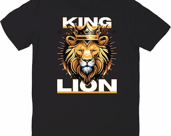 May include: A black short-sleeve t-shirt featuring a graphic of a lion wearing a gold crown. The word KING is printed in white above the lion, and the word LION is printed in white below the lion, with gold accents radiating from the center.