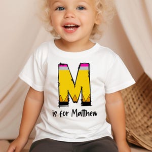 Camiseta personalizada para niños de regreso a clases, camiseta con letras de lápiz, camiseta personalizada con letras del alfabeto y nombre para jardín de infantes, preescolar, niño y niña.