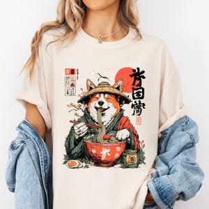 Camiseta de ramen Comfort Colors®, camiseta de perro japonés comiendo fideos, camiseta de comida de anime adorable, camiseta con estampado de perro kawaii, camiseta de ramen unisex