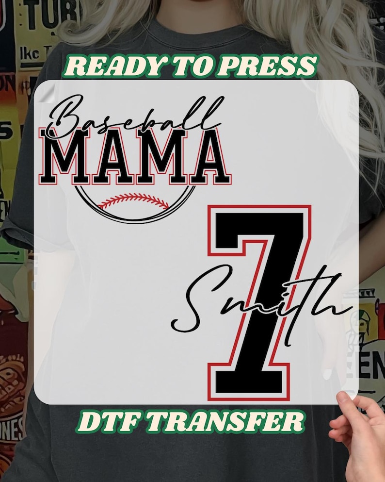May include: White DTF transfer with the words "Baseball MAMA" in black and red, a baseball graphic, the number 7, and the name "Smith". The text "READY TO PRESS" and "DTF TRANSFER" are also included.