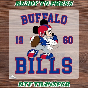 May include: A DTF transfer featuring a cartoon mouse wearing a red and blue football helmet and uniform, holding a brown football. The text reads READY TO PRESS, BUFFALO, 19, 60, BILLS, and DTF TRANSFER in blue and red block lettering.