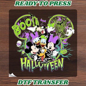 May include: A DTF transfer sheet featuring a Halloween graphic with Mickey Mouse, Minnie Mouse, Donald Duck, Daisy Duck, Goofy, and Pluto wearing skeleton costumes. The design includes the text BOO!! HALLOWEEN, a spider web, bats, a ghost, a skull, and a jack-o'-lantern in lime green, purple, and black colors.