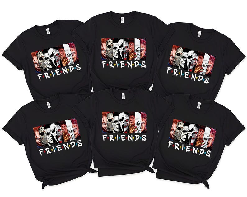 May include: Six black t-shirts with a graphic featuring horror movie characters and the word "FRIENDS" in white. The graphic includes faces of iconic horror characters. The shirts are short-sleeved.