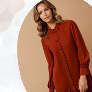 Puede incluir: Un vestido de manga larga color óxido con botones en la parte delantera, cuello camisero y bajo con volantes. El vestido presenta un corte entallado con puños abotonados y un bolsillo en el pecho. La modelo lleva el vestido.
